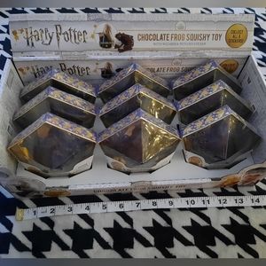 9x NEW Harry Potter Chocolate Frog Squishy with store display.